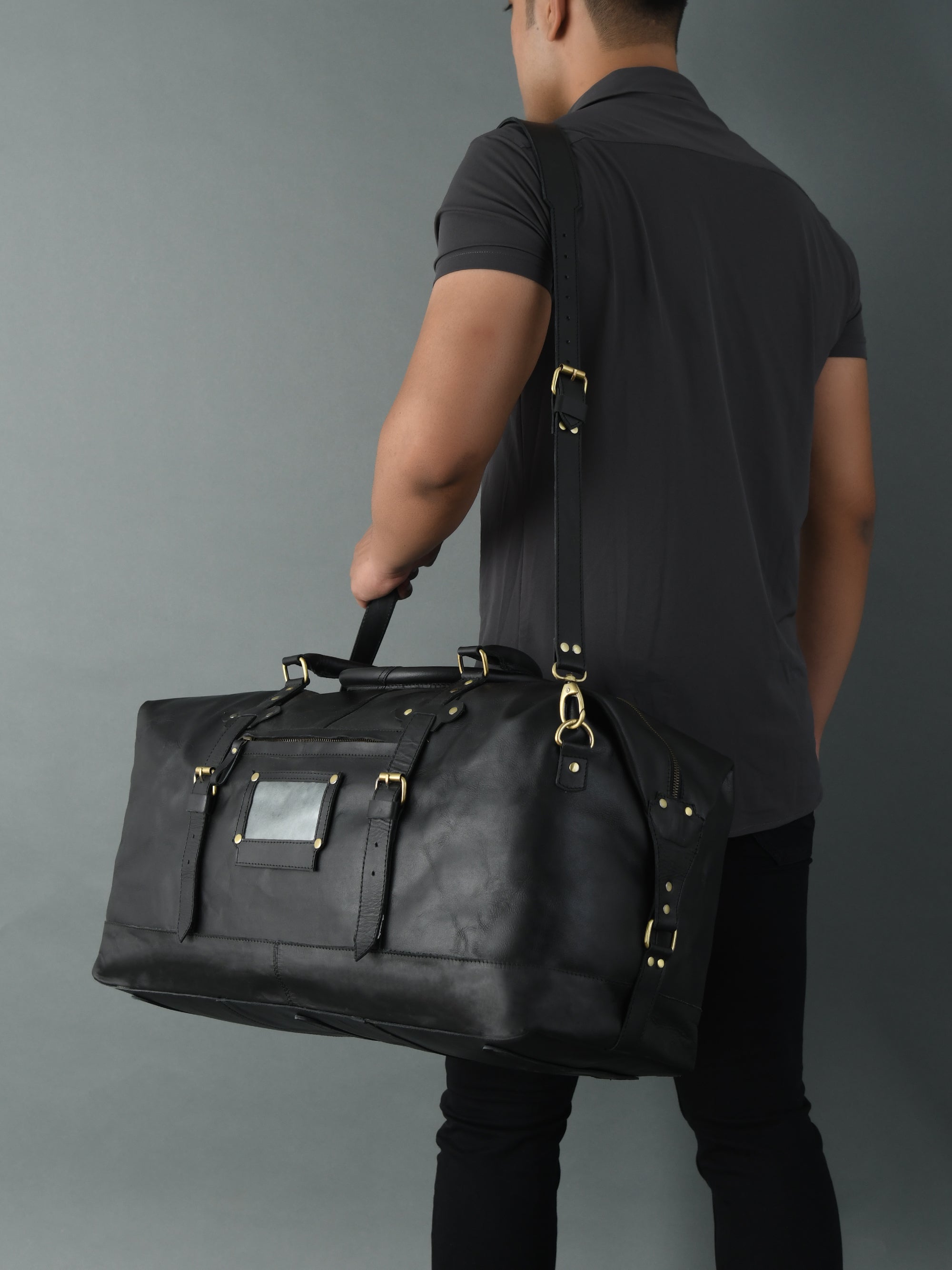 Classic Black Leather Side-Pocket Travel Duffel Bag